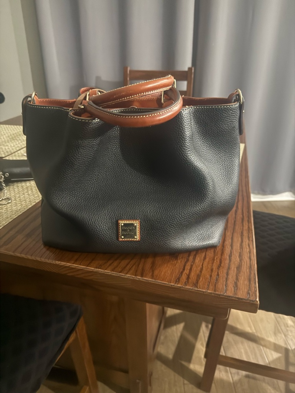 Dooney & Bourke Black Pebbled Leather Tote with Brown Handles